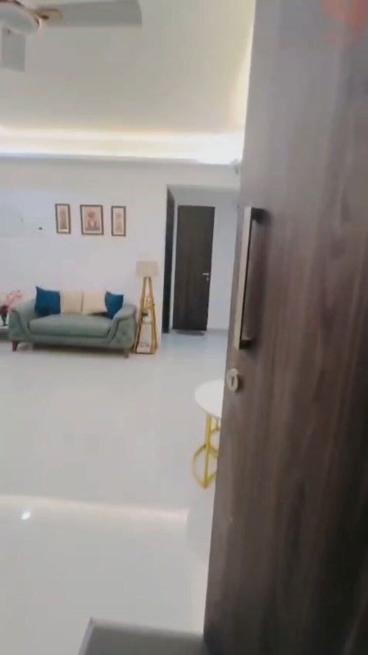 Living Room, dev-leo-tower 2 Bedroom 670 Sq.Ft. Apartment In Oshiwara Mumbai 9811073