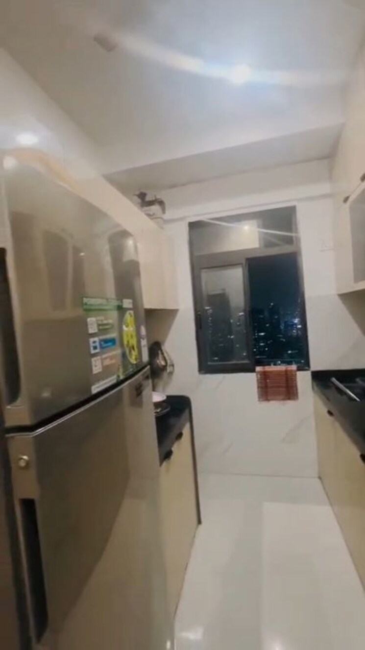 Kitchen, dev-leo-tower 2 Bedroom 670 Sq.Ft. Apartment In Oshiwara Mumbai 9811073