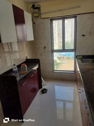 Kitchen in 1 BHK Apartment at Dharti Presidio, Malad West – for Sale