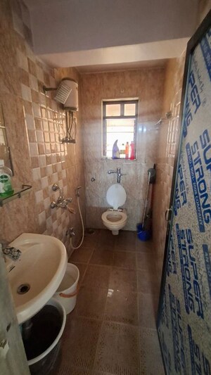 Bathroom in 2 BHK Apartment at Kesar Ridhi Sidhi, Andheri East – for Rent