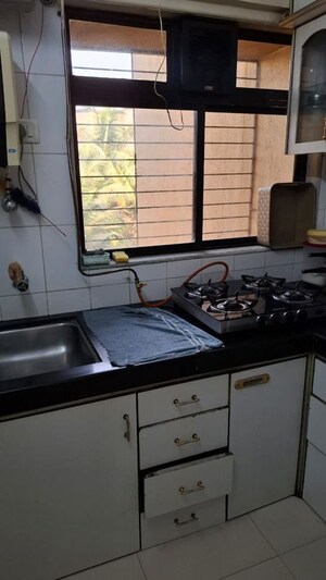 Kitchen in 2 BHK Apartment at Kesar Ridhi Sidhi, Andheri East – for Rent