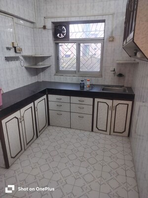 Kitchen in 1 BHK Apartment at Asmita Jyoti CHS, Malad West – for Rent