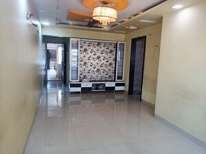 Living Room in 2 BHK Apartment at Asmita Jyoti CHS, Malad West – for Rent
