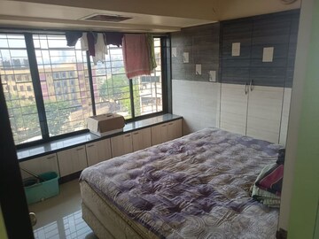 Bedroom in 2 BHK Apartment at Asmita Jyoti CHS, Malad West – for Rent
