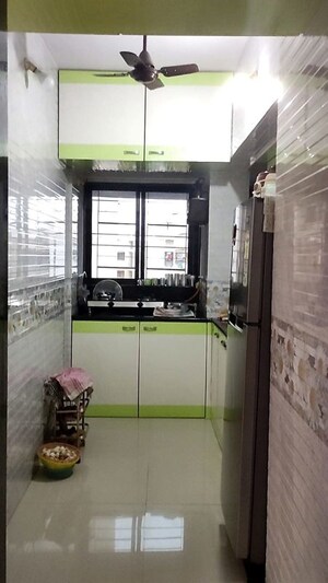Kitchen in 2 BHK Apartment at Asmita Jyoti CHS, Malad West – for Rent