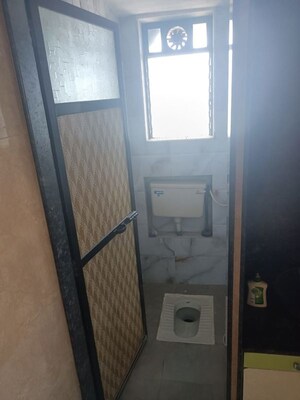 Bathroom in 2 BHK Apartment at Asmita Jyoti CHS, Malad West – for Rent