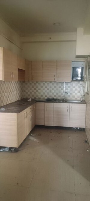 Kitchen in 2 BHK Apartment at Gaur City 6th Avenue, Sector 4 Greater Noida – for Rent