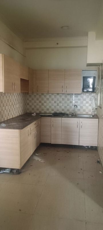 Kitchen in 2 BHK Apartment at Gaur City 6th Avenue, Sector 4 Greater Noida – for Rent