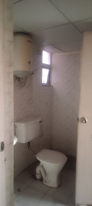 Bathroom in 2 BHK Apartment at Gaur City 6th Avenue, Sector 4 Greater Noida – for Rent