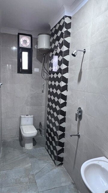 Bathroom in 3 BHK Builder Floor at Raj Nagar – for Sale