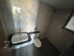 Bathroom in 2 BHK Apartment at Pride Purple Park Titan, Hinjewadi – for Rent