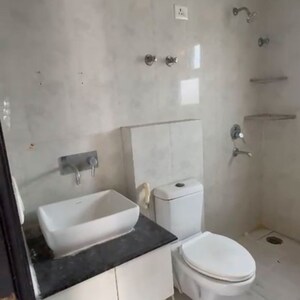 Bathroom in 3 BHK Apartment at Oxirich Avenue, Ahinsa Khand 2 – for Rent