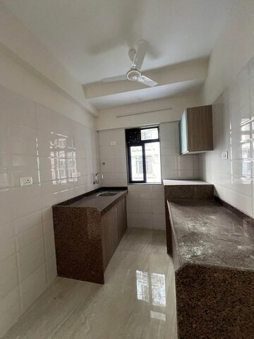 Kitchen in 1.5 BHK Apartment at Chandiwala Pearl Heaven, Andheri East – for Rent