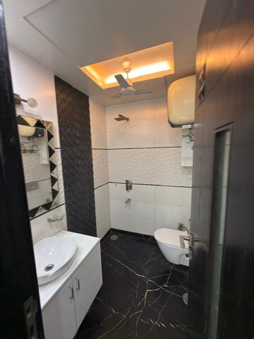 Bathroom in 3 BHK Apartment at Rohini Sector 13 – for Sale