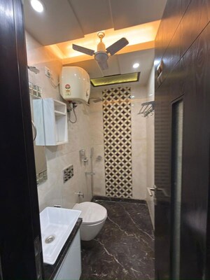 Bathroom in 3 BHK Apartment at Rohini Sector 13 – for Sale