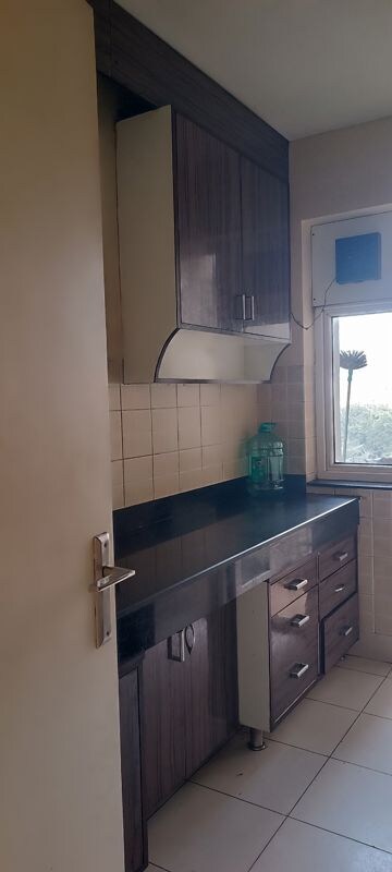 Kitchen in 3 BHK Apartment at Mahindra Aura, Sector 110a – for Rent