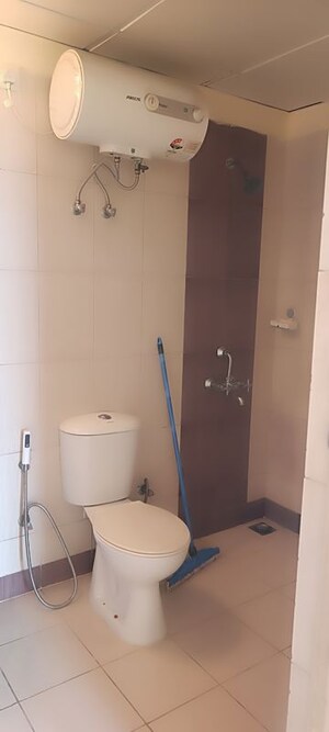 Bathroom in 3 BHK Apartment at Mahindra Aura, Sector 110a – for Rent
