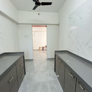 Kitchen in 2 BHK Apartment at Riddhi Rajendra Nagar Swagat CHS, Datta Pada – for Rent