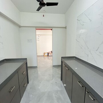 Kitchen in 2 BHK Apartment at Riddhi Rajendra Nagar Swagat CHS, Datta Pada – for Rent