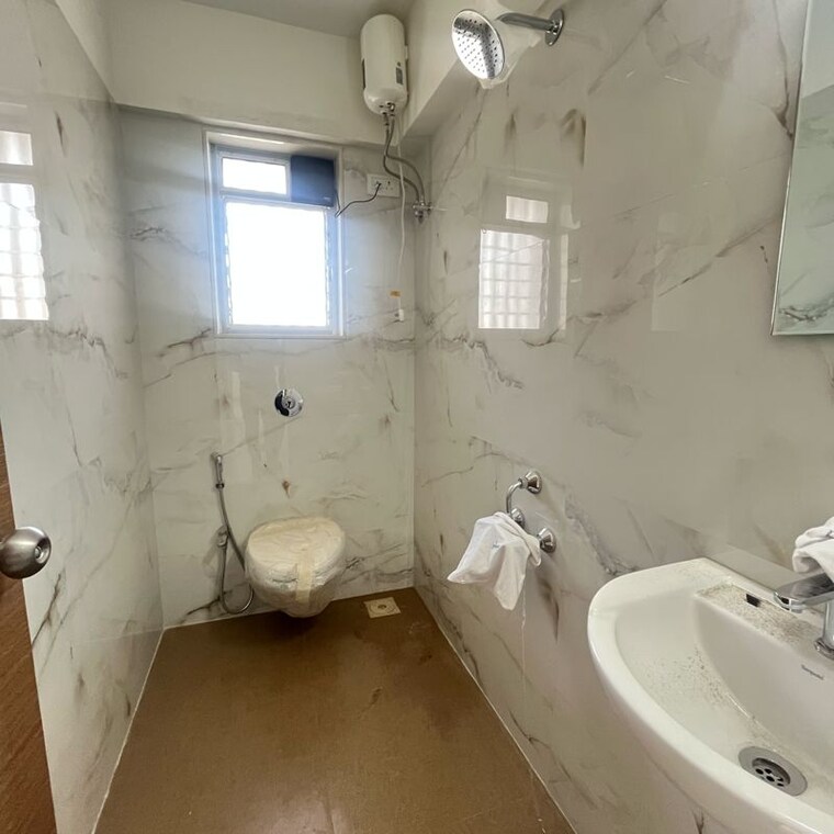 Bathroom, riddhi-rajendra-nagar-swagat-chs 2 Bedroom 676 Sq.Ft. Apartment In Datta Pada Mumbai 9811504