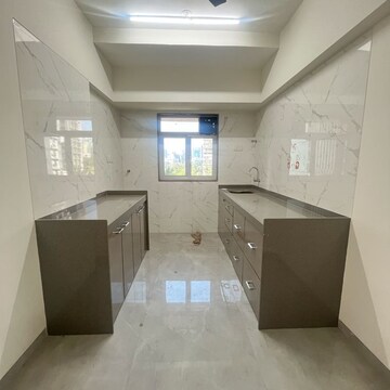 Kitchen in 2 BHK Apartment at Riddhi Rajendra Nagar Swagat CHS, Datta Pada – for Rent