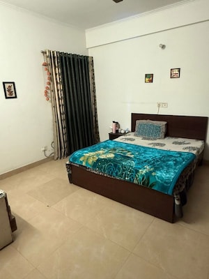 Bedroom in 2 BHK Apartment at Aims Golf City, Sector 75 – for Rent