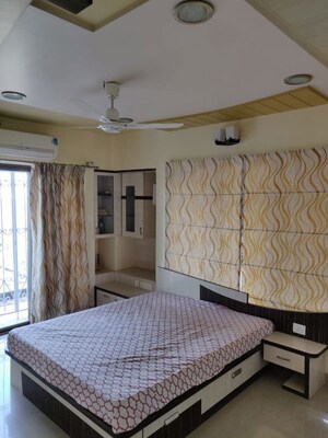 Bedroom in 3 BHK Apartment at Amrut Kalash CHS, Karve Road – for Rent