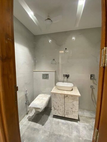 Bathroom in 4 BHK Builder Floor at Ansal Sushant Lok I, Sector 43 – for Rent