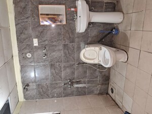Bathroom in 3 BHK Apartment at Mittal Rajnagar Residency, Raj Nagar Extension – for Sale