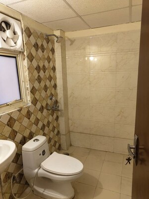 Bathroom in 2 BHK Apartment at SCC Sapphire, Raj Nagar Extension – for Rent