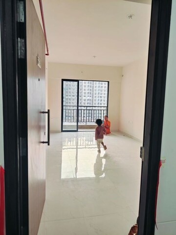 Building Lobby in 2 BHK Apartment at Runwal Garden City, Balkum Pada – for Rent