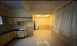 Living Room in 2 BHK Apartment at Hazratganj – for Sale