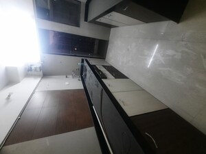 Kitchen in 2 BHK Apartment at Cosmos Springs Angel, Ghodbunder Road – for Rent