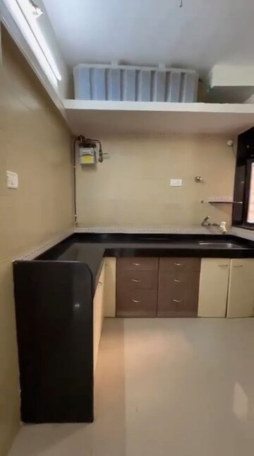 Kitchen in 2 BHK Builder Floor at Sai Darpan CHS, Mira Road – for Rent