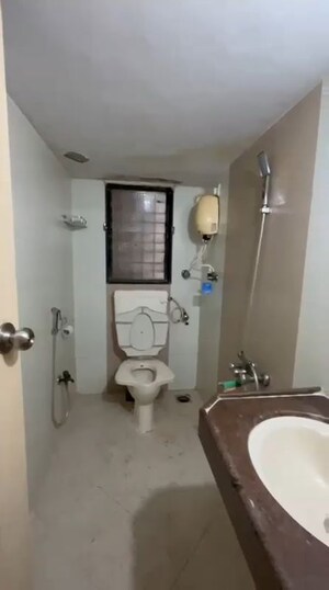 Bathroom in 2 BHK Builder Floor at Sai Darpan CHS, Mira Road – for Rent
