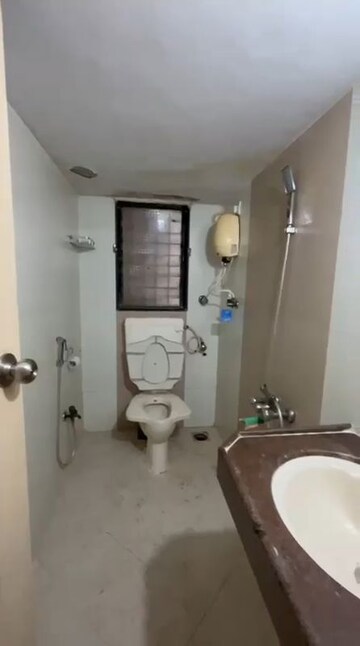 Bathroom in 2 BHK Builder Floor at Sai Darpan CHS, Mira Road – for Rent