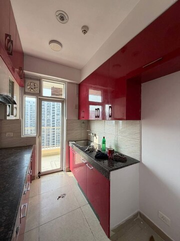 Kitchen in 2 BHK Apartment at Ajnara Homes, Sector 16b Greater Noida – for Rent