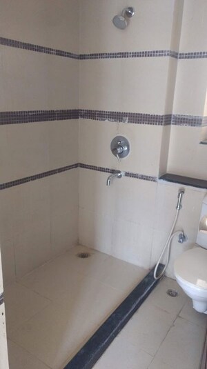 Bathroom in 2 BHK Apartment at Unitech Uniworld Gardens 2, Sector 47 – for Rent