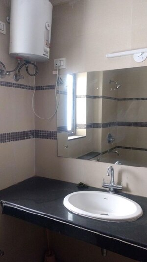 Bathroom in 2 BHK Apartment at Unitech Uniworld Gardens 2, Sector 47 – for Rent