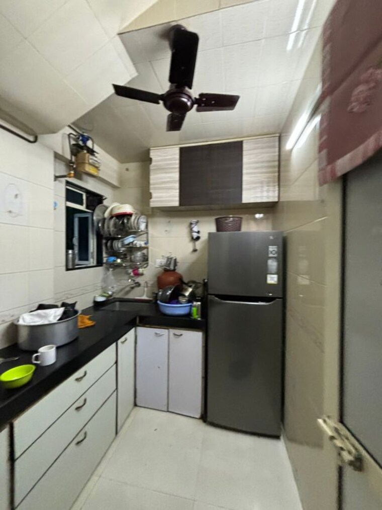 Kitchen, seven bunglow 2 Bedroom 600 Sq.Ft. Apartment In Seven Bunglow Mumbai 9812073