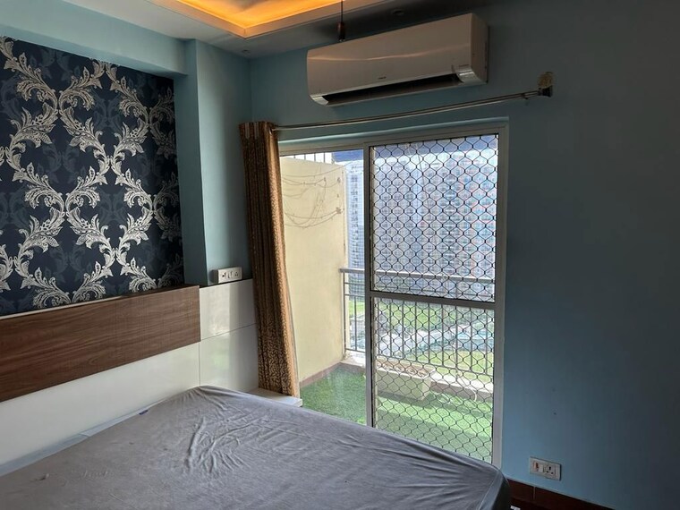 Bedroom, aims-golf-city 2.5 Bedroom 1150 Sq.Ft. Apartment In Sector 75 Noida 9217444