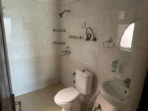 Bathroom in 2.5 BHK Apartment at Aims Golf City, Sector 75 – for Rent