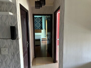 Building Lobby in 2.5 BHK Apartment at Aims Golf City, Sector 75 – for Rent