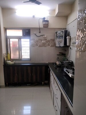 Kitchen in 2 BHK Apartment at Cosmos Angel, Thane West – for Rent
