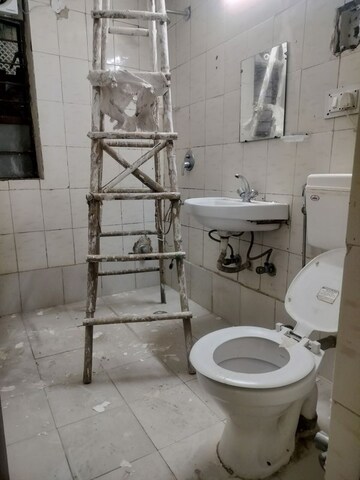 Bathroom in 2 BHK Apartment at Vasant Kunj – for Sale