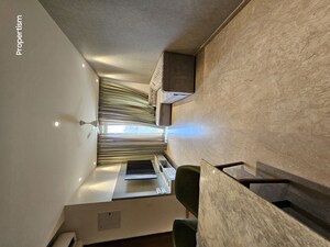 Staircase in 2 BHK Apartment at Hiranandani Castle Rock, Powai – for Rent