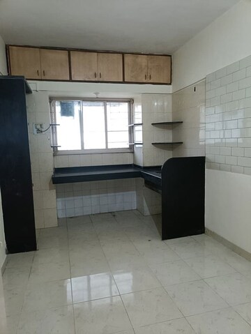 Kitchen in 3 BHK Apartment at Megh Malhar Apartment, Warje – for Sale
