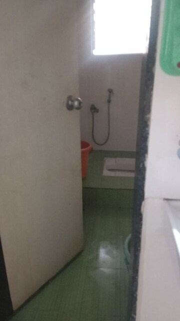Bathroom in 3 BHK Apartment at Megh Malhar Apartment, Warje – for Sale