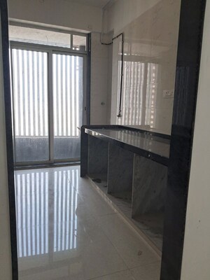 Kitchen in 2 BHK Apartment at Raj Infinia, Malad West – for Rent