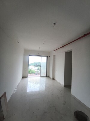 Living Room in 2 BHK Apartment at Ajmera Crosstown One, Kalyan West – for Sale